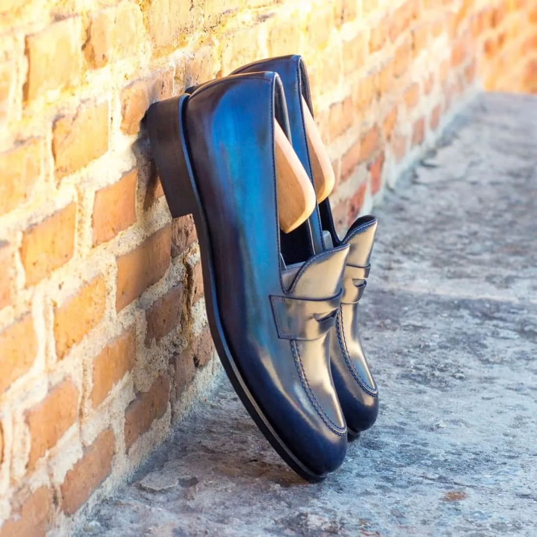 Mocassins Penny à bandeau en cuir patiné bleu