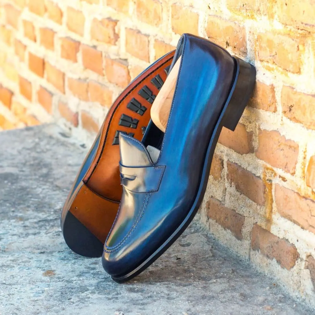 Mocassins Penny à bandeau en cuir patiné bleu